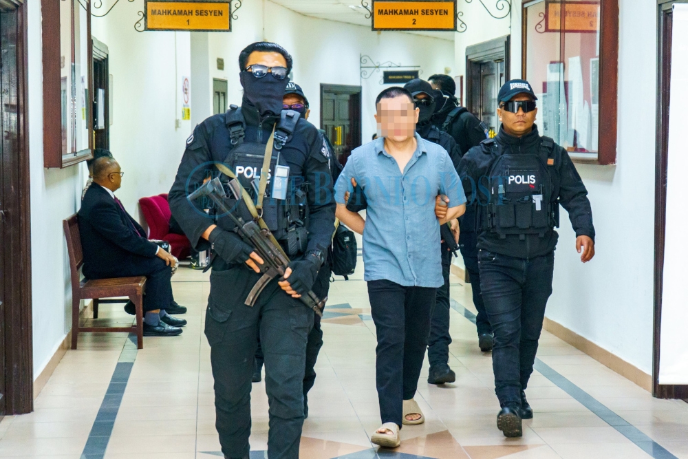 Alleged Gang 24 Hung Hung top member pleads not guilty in Sarawak to having over 120 rounds of ammo, firearm