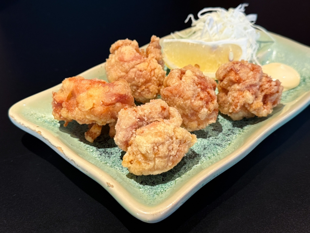 Nibble on this crispy-skinned Karaage with moist meat shaped in a ball. — Picture by Lee Khang Yi