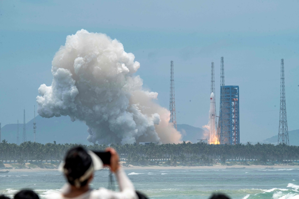 China takes a giant leap towards cheaper space launches as reusable rocket returns home