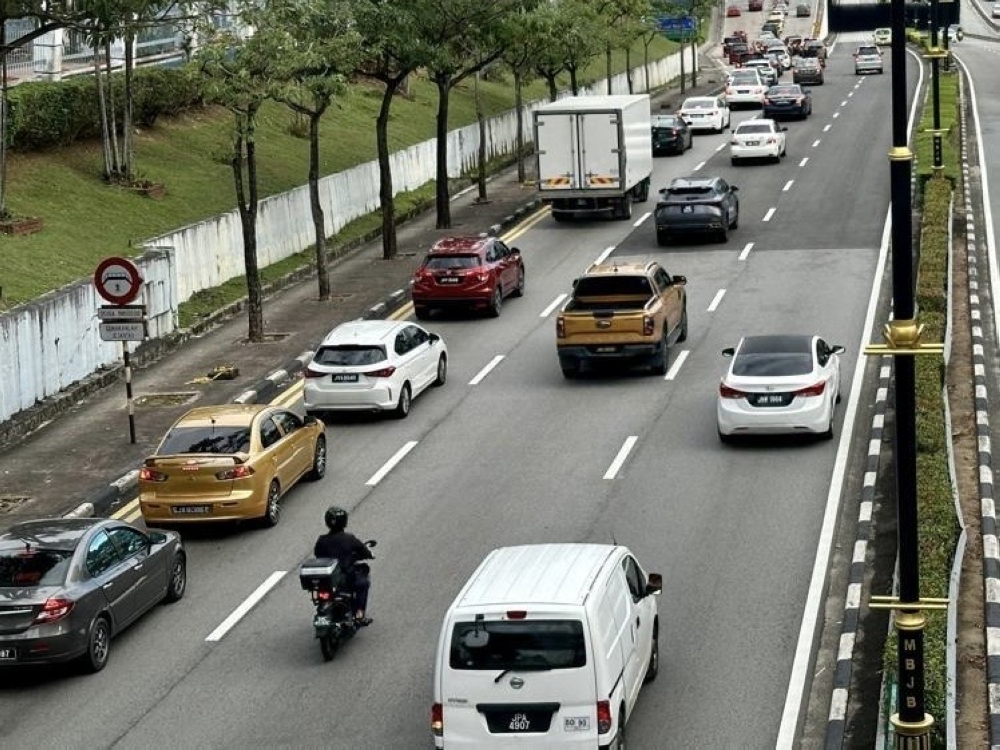 Despite the increase in vehicles entering the Johor Bahru city centre, traffic was reported to be at a moderate flow towards the afternoon. July 11, 2026. — Picture by Ben Tan