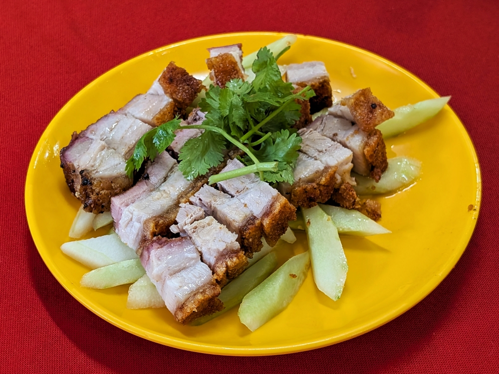 The true ‘pièce de résistance’ here should be the excellent roast pork. — Picture by Ethan Lau