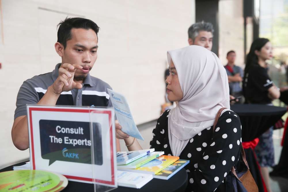 The writer says that stronger financial literacy and better access to debt counselling are needed to help young Malaysians navigate an increasingly complex credit environment. — Picture by Choo Choy May.