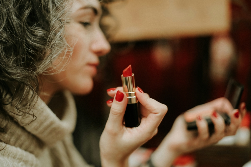 Also known as the Lipstick Effect, treating oneself to beauty products, specialty coffee occasionally is seen as a copy mechanism during uncertain economic times. — Unsplash pic