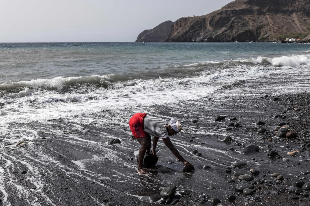Cape Verde’s black sand trade leaves women and beaches paying the price