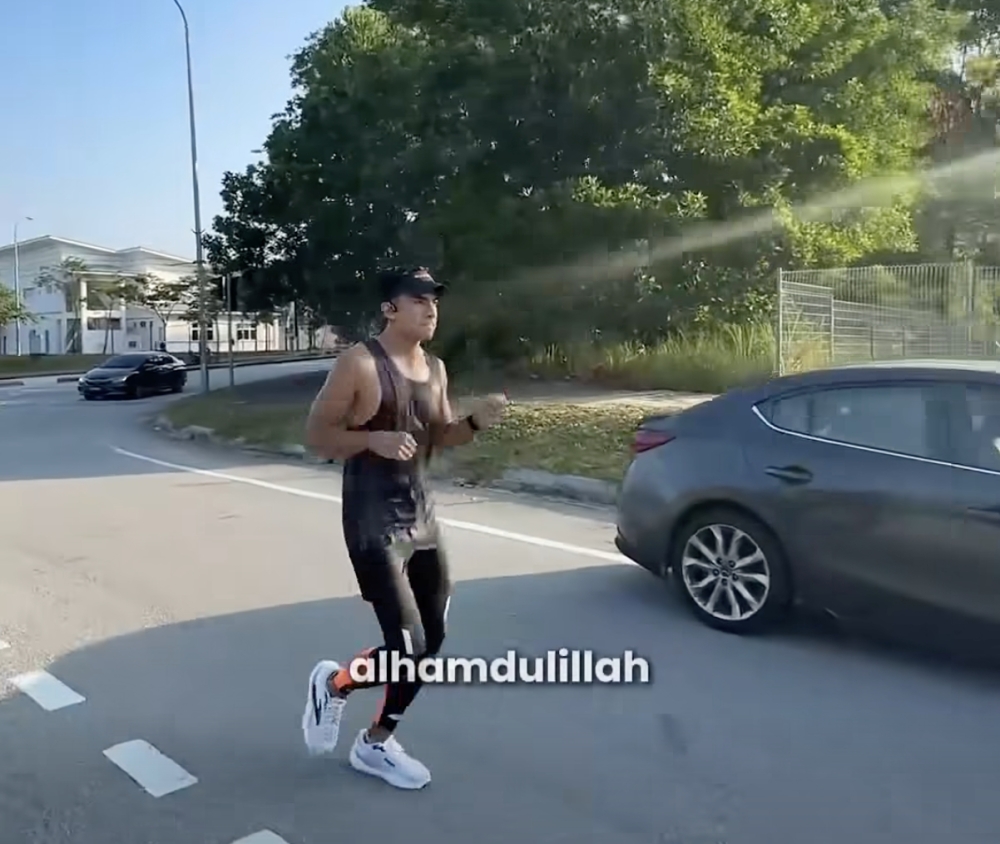 Syed Saddiq hobbles across finish after agonising cramps as day-two charity run smashes RM200,000 fundraising goal