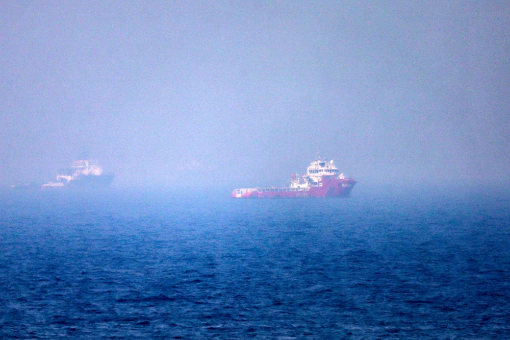 Vessel on fire in Strait of Hormuz as US and Iran vie for control