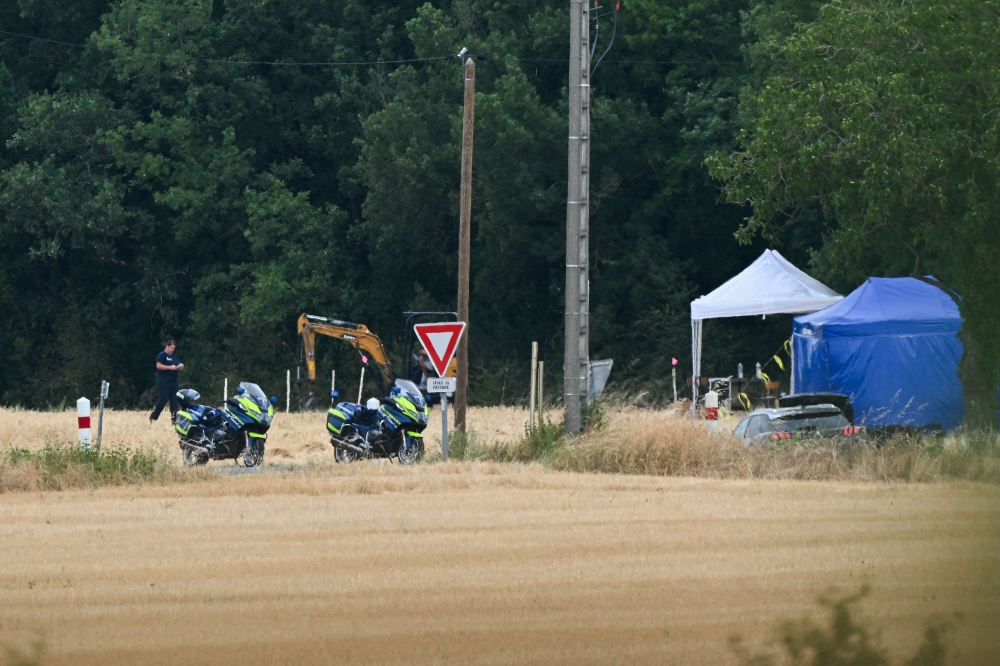 French gendarmes search for the remains of Delphine Jubillar at a site in Villeneuve-sur-Vere, southern France where her husband Cedric Jubillar said he buried her. — AFP pic