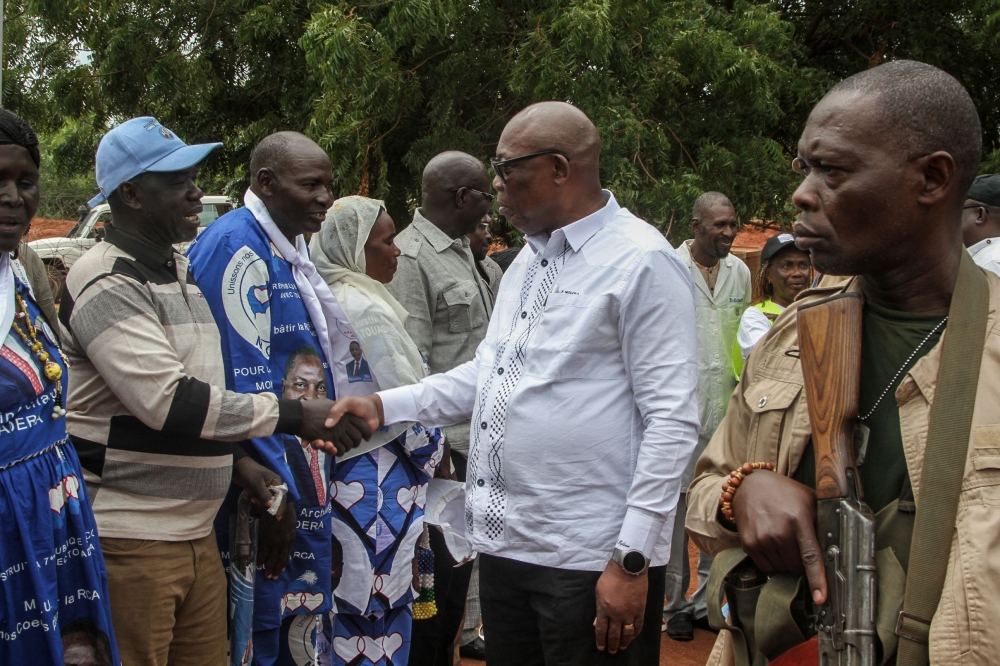 Central African Prime Minister Felix Moloua (centre) greets residents during a visit to Birao on July 18, 2026 following a deadly June 30 attack in nearby Am Dafock near the Sudan border. — AFP pic
