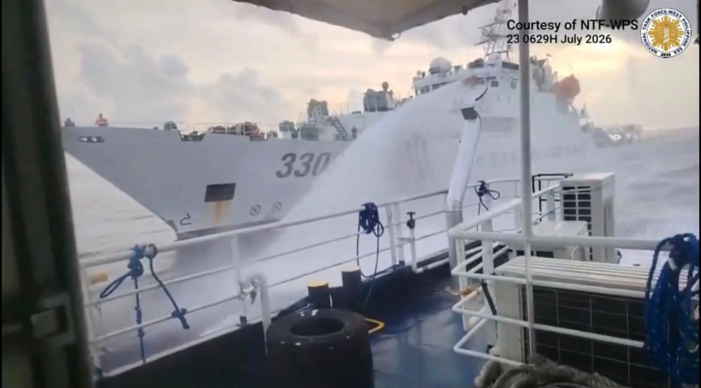 China fires water cannon at Philippine coast guard vessels near Scarborough Shoal