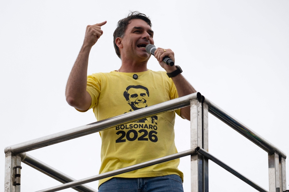 Brazil’s senator Flavio Bolsonaro, son of Brazil’s former president (2019-2022) Jair Bolsonaro, on trial for his alleged role in an attempted coup, delivers a speech in a demonstration during Independence Day, at Copacabana beach in Rio de Janeiro, Brazil on September 7, 2025. — AFP pic