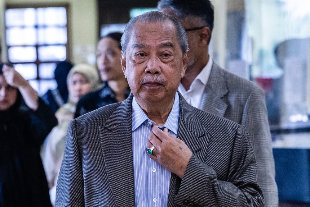 Former prime minister Tan Sri Muhyiddin Yassin is pictured at the Kuala Lumpur High Court Complex on July 28, 2026. — Picture by Firdaus Latif