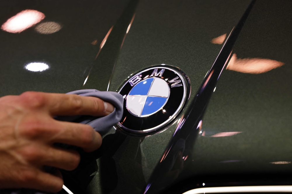BMW aims to cut 8,000 jobs in Germany as cost pressures mount, says source