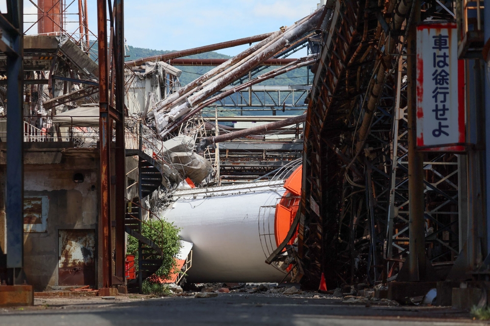Rescuers search for survivors after powerful Japan quake kills at least 13