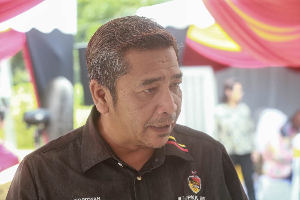 Norizwan Zainal Abidin, Kampung Mantin Dalam Village Development and Security Committee (JPKK) chairman. Although BN and DAP are once again contesting against each other in this election, Norizwan said their working relationship under the unity government had allowed development programmes and village administration to continue without major disruption. — Picture by Sayuti Zainudin