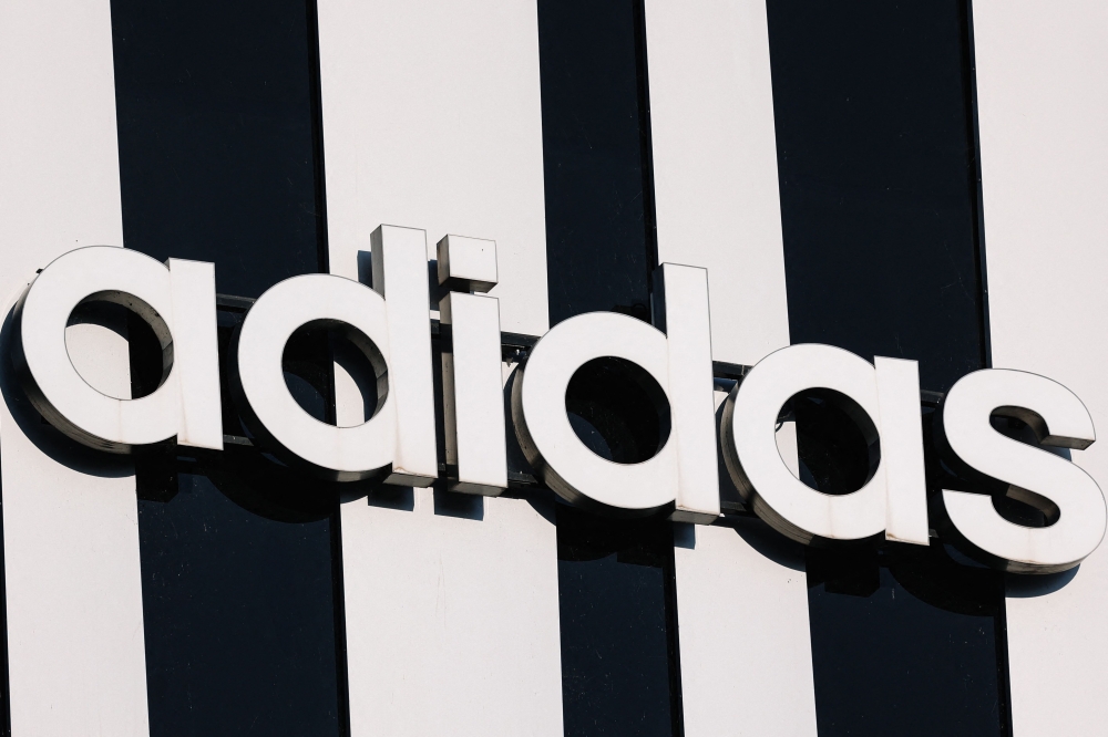 Adidas shares plunge 17pc as World Cup marketing costs hammer quarterly profit