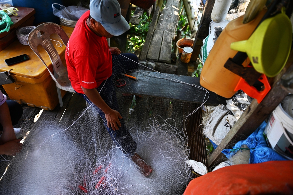 For Sarawak’s fishermen, a new bridge changes the economics of the catch
