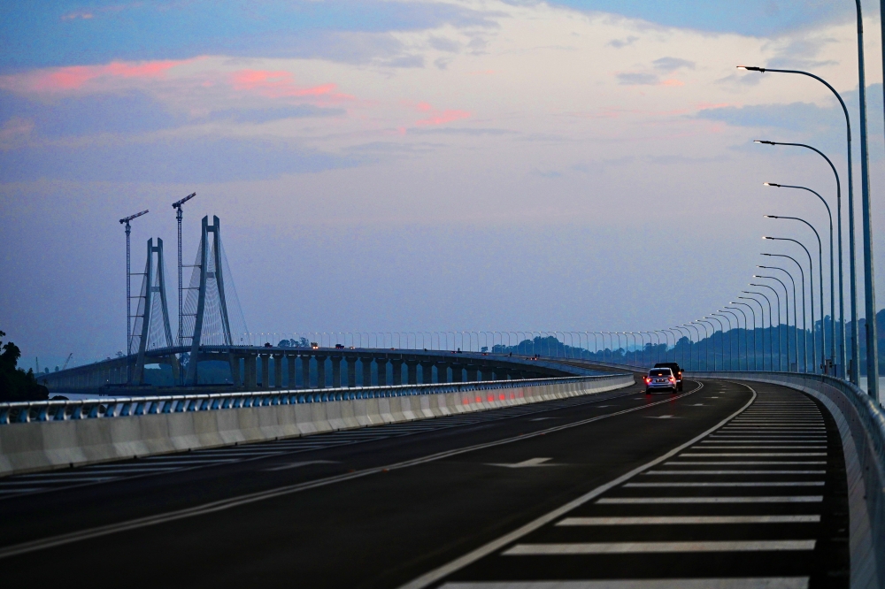 The 4.84km Batang Lupar 1 Bridge linking Sebuyau and Maludam has reduced reliance on ferry services and opened new markets for local fishing communities. — Bernama pic