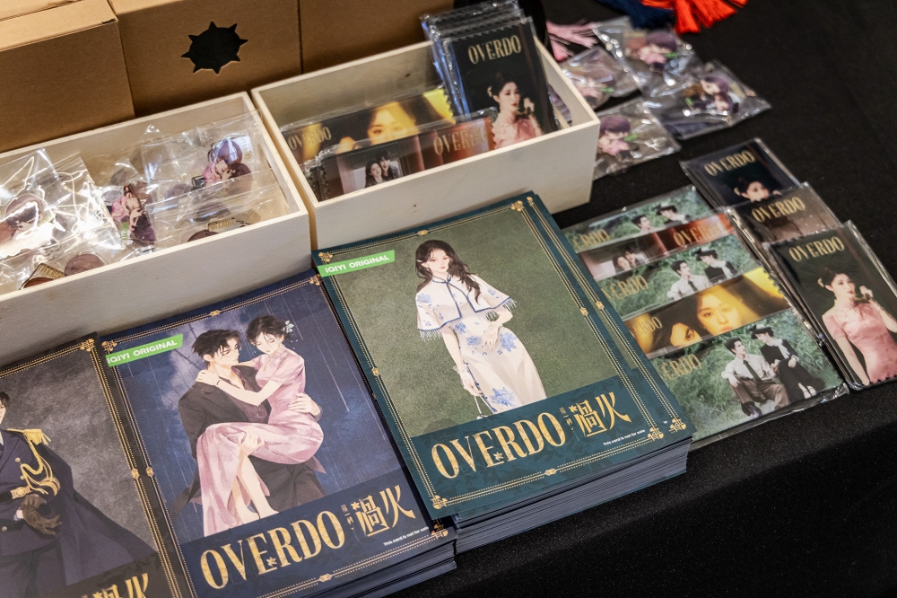 Exclusive ‘Overdo’ merchandise taken home by fans after they completed the event’s activities. — Picture by Firdaus Latiff