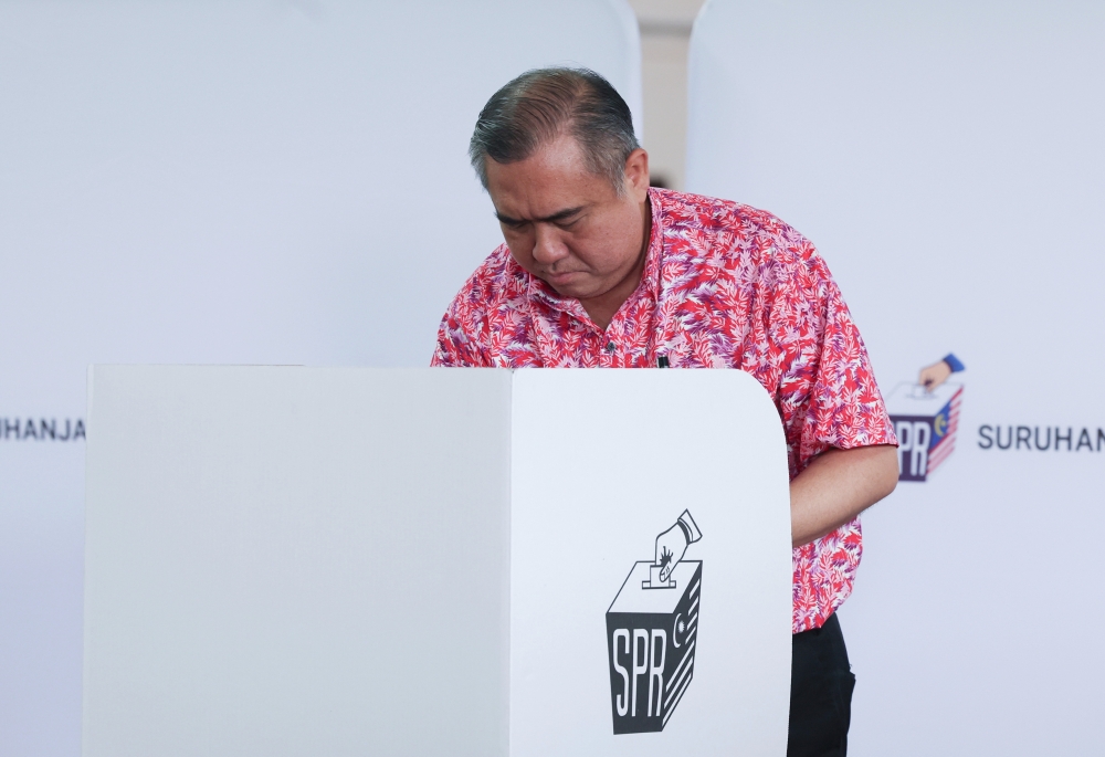DAP secretary-general Anthony Loke casts his ballot at the polling centre at SJKC Kelpin in Jalan Tok Ungku, Taman Ujong, Seremban, during the 16th Negeri Sembilan state election on August 1, 2026. — Bernama pic