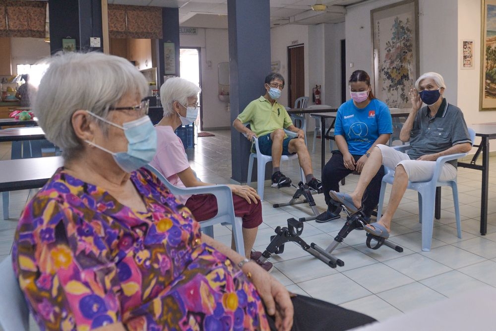 People sit at the Alzheimer’s Disease Foundation Malaysia’s day-care centre in Petaling Jaya. — Picture by Miera Zulyana 