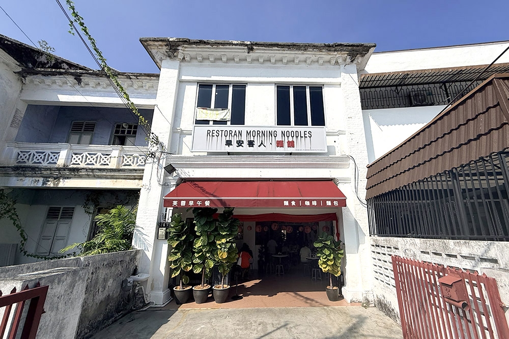 The large pots of fiddle-leaf figs at the entrance provide shade from the sun. — Pictures by CK Lim