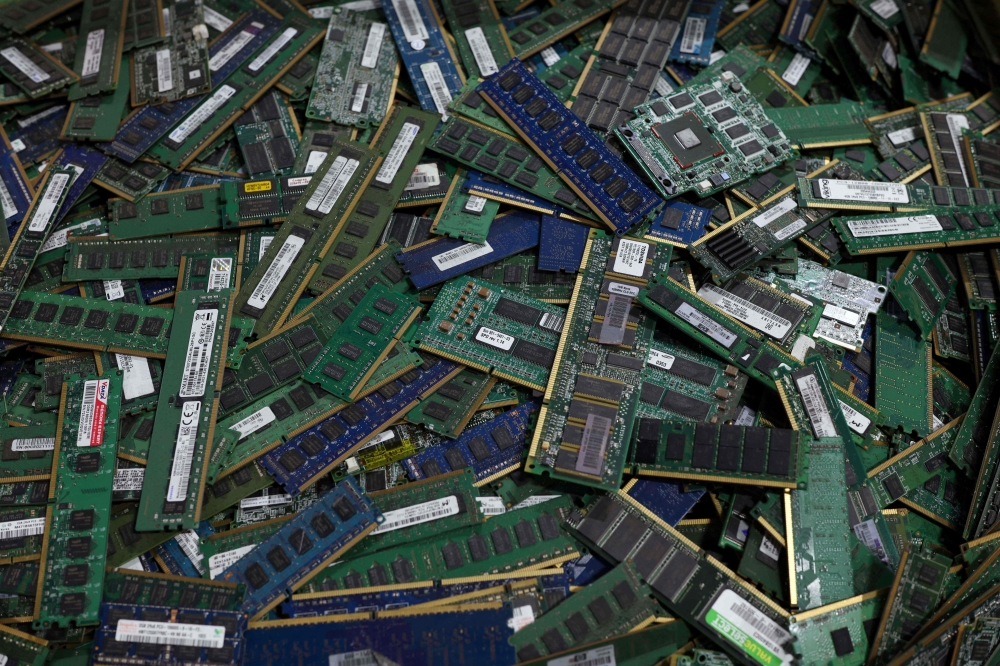 Electronic components wait to have gold chemically removed at The Royal Mint in Llantrisant, south Wales on June 30, 2026. — AFP pic