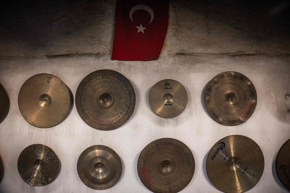 This photograph shows cymbals displayed on a wall at a workshop in Istanbul on July 30, 2026.  — AFP pic