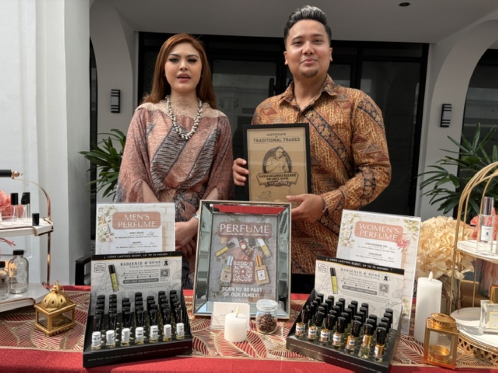 Sheikh Muhammad Badjenid mixes ingredients to make perfume. — Picture courtesy of Penang Global Tourism