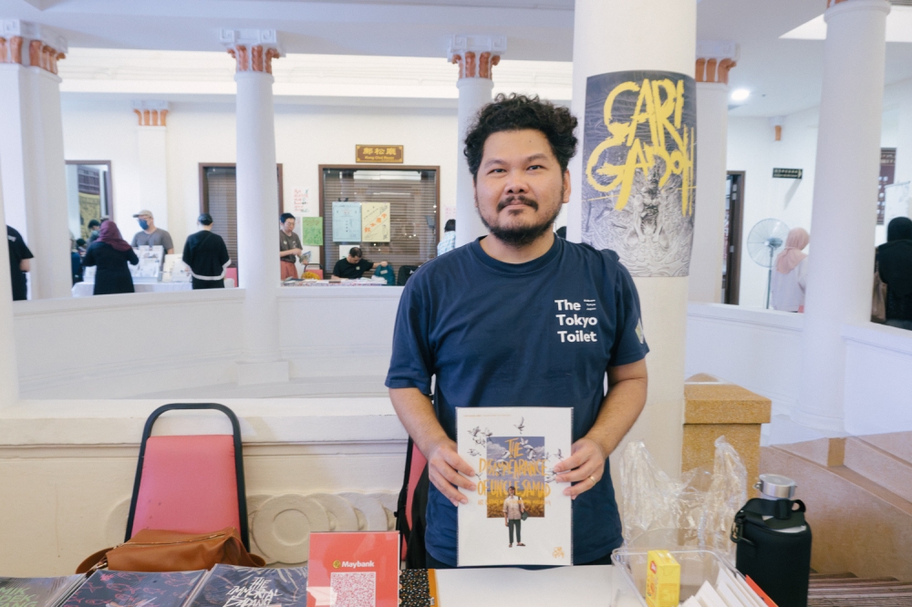 Charukphong Anuvong showcased comics featuring slice-of-life stories largely set in northern Malaysia, where he was born and raised, at KL Zine Etc 2026. — Picture by Raymond Manuel