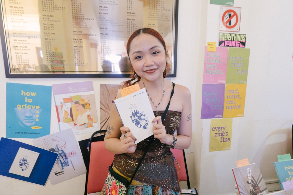 Jonah represented Everything Fine, an independent small-press bookstore from the Philippines, at KL Zine Etc 2026. — Picture by Raymond Manuel