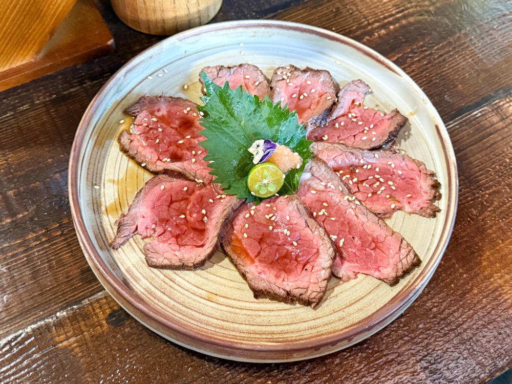 Rare Steak with Yuzu Vinegar is a good companion with drinks. — Picture by Lee Khang Yi