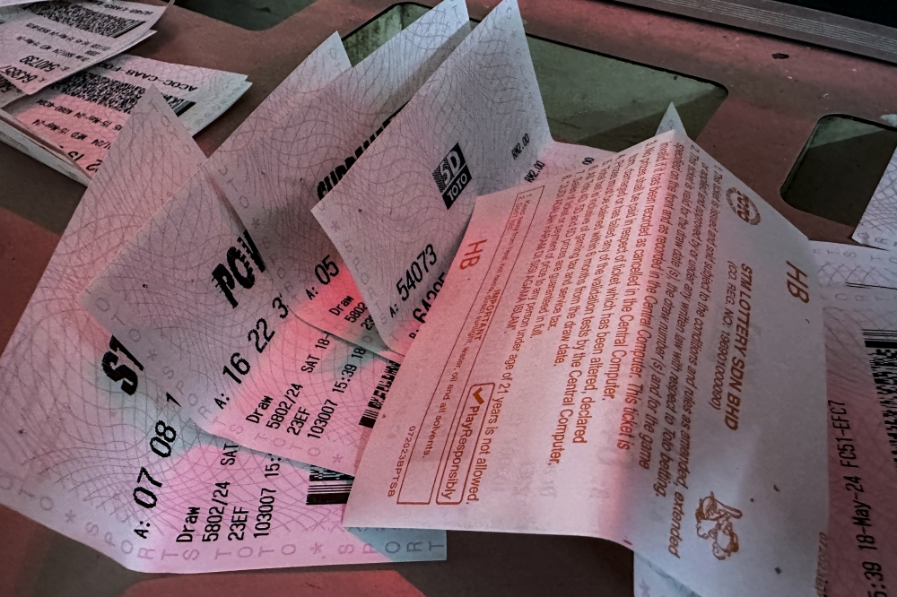 File picture of a lottery ticket with the words ‘Judi Adalah Haram Di Sisi Agama Islam’ printed on its back. — Picture by Hari Anggara
