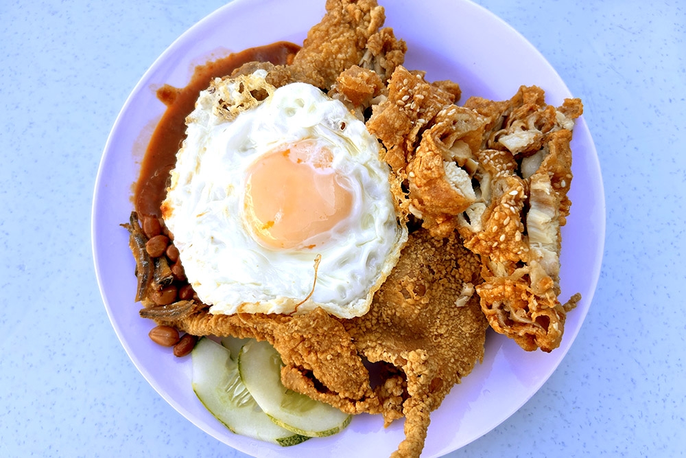 Don’t miss the ‘nasi lemak’ and the sesame-studded fried chicken. — Picture by CK Lim
