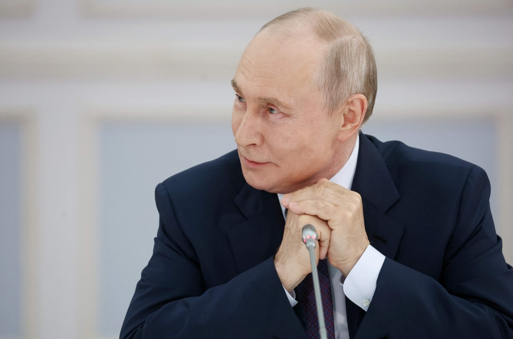 In this pool photograph distributed by the Russian state agency Sputnik, Russia’s President Vladimir Putin attends a meeting with urban planners in Ulan-Ude on August 10, 2026. — AFP
