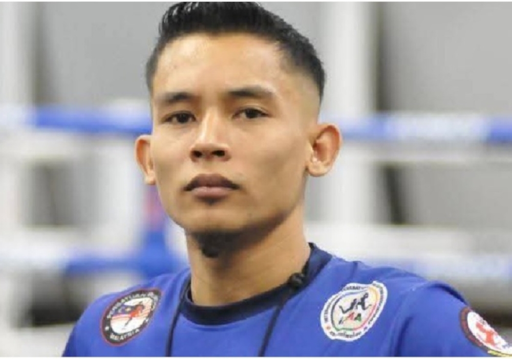 Muhammad Hairie Mahmad, a former SHG Telok Mas trainee who went on to become champion at the 2022 IFMA Muaythai World Championships. — Bernama pic 