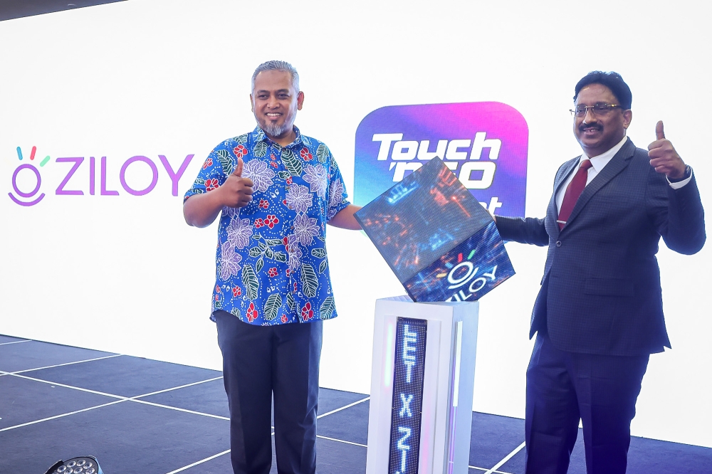 TNG Digital chief operations officer Mohd Herman Sarbini (left) with QuantumNexis chairman Dr Suresh Venkatachari (right) during the launch of MindCare by Ziloy on TNG eWallet on August 12, 2026. — Picture by Yusof Mat Isa