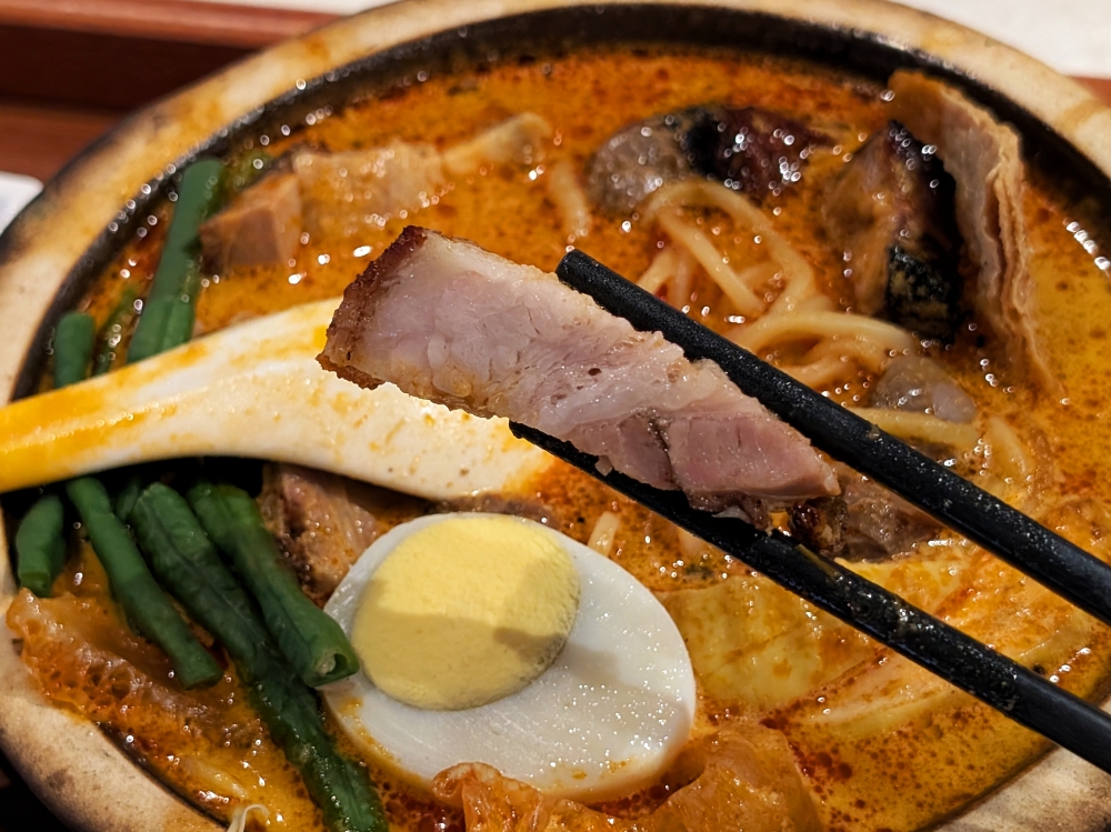 The roast pork sports paper-thin crackling and the ideal ratio of lean meat and fat.