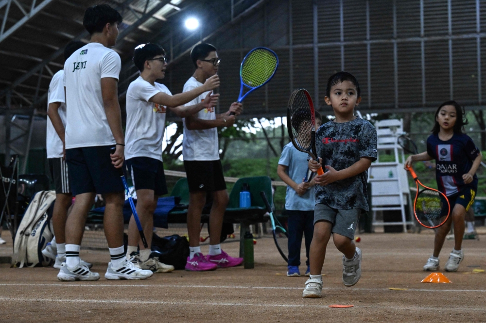The more Filipino children take up the sport, the better the odds of finding the next Eala, said PhilTA’s Mendoza. — AFP PIC