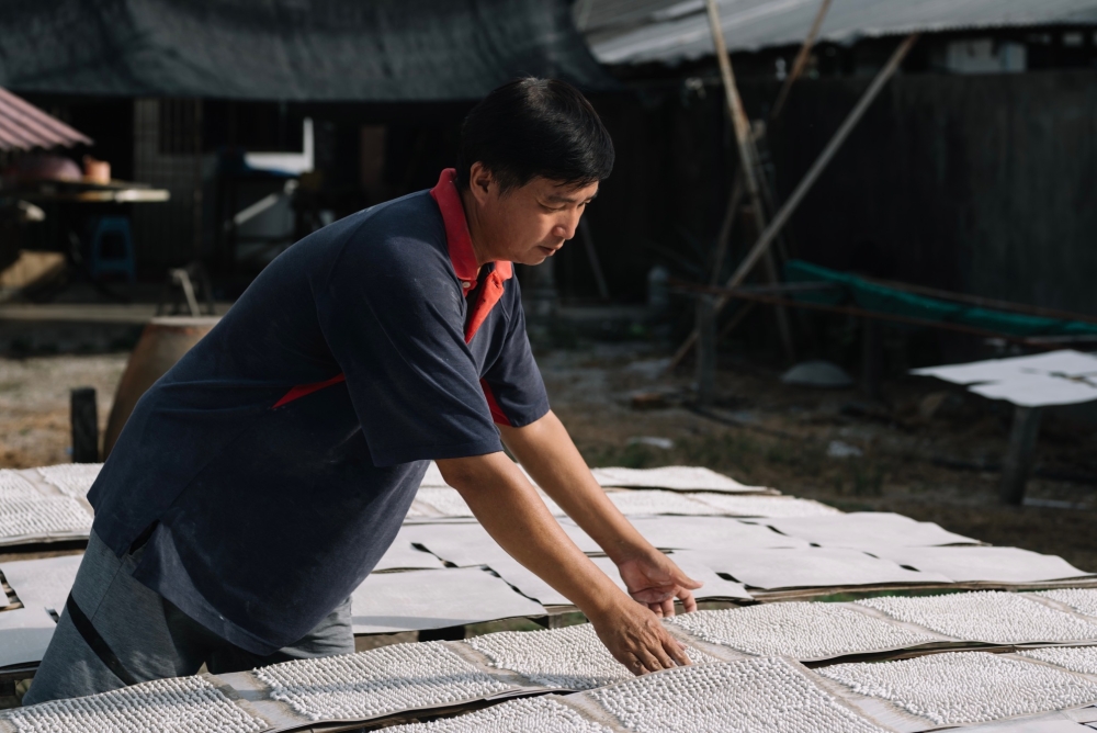 Yeoh packs about 100 bottles a day, but completing a single batch can take at least 40 days. — Picture courtesy of Penang Global Tourism