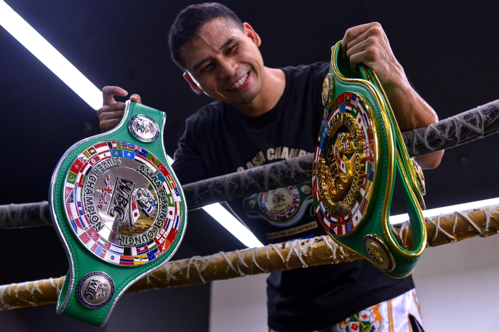 Aiman, who competes in the super featherweight division, now boasts a professional record of 13 wins, two losses and one draw. — Bernama pic
