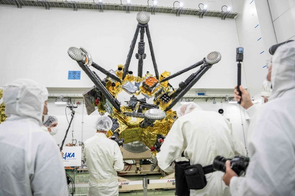 Members of the media film the Exploration and Return Modules of the Martian Moons eXploration (MMX) spacecraft at the Tanegashima Space Center in Minamitane, Kagoshima prefecture, on August 13, 2026. — AFP pic