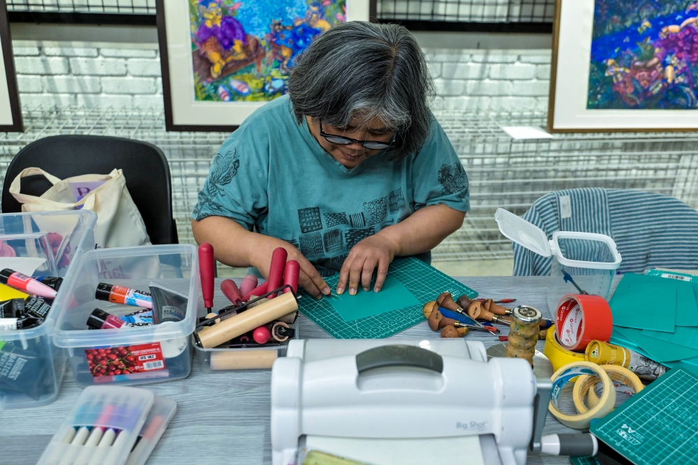 Norhayati Kaprawi said she chose printmaking, particularly block printing, as her artistic medium because she wanted to see more women artists remain active in the field. — Bernama pic