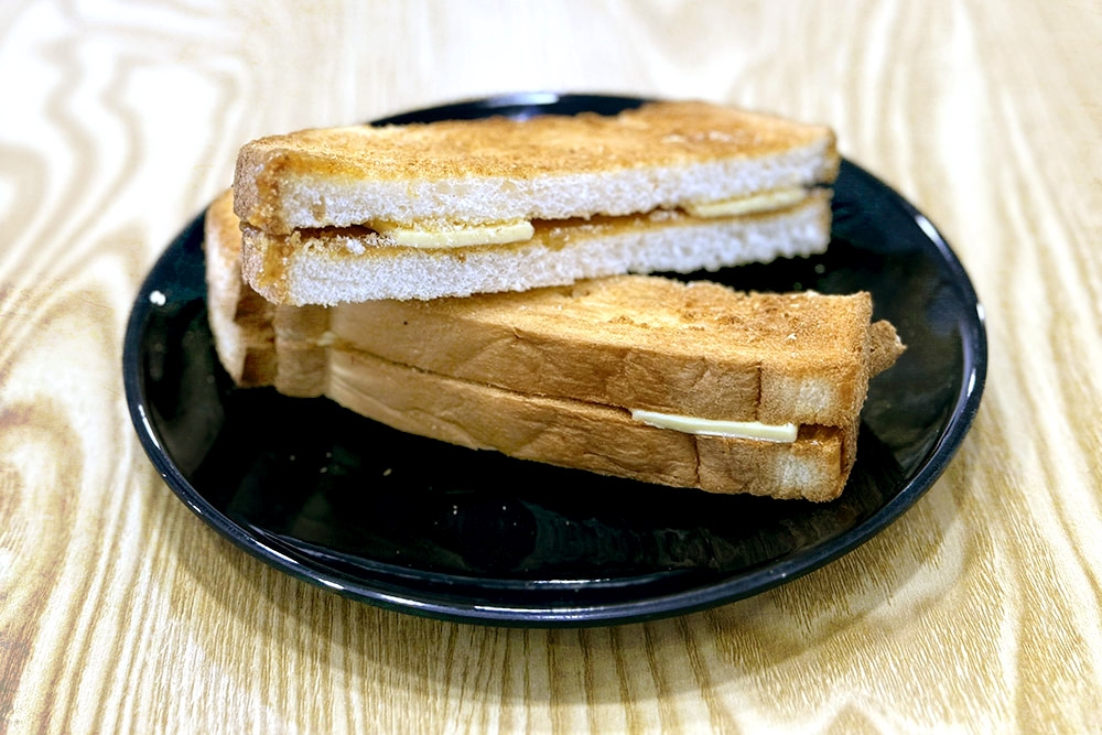 Classic butter and ‘kaya’ toast. — Picture by CK Lim