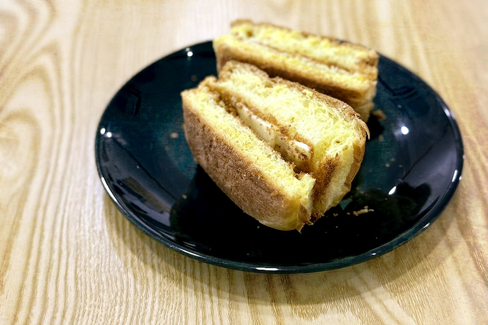 Rustic looking round ‘roti’ with butter. — Picture by CK Lim