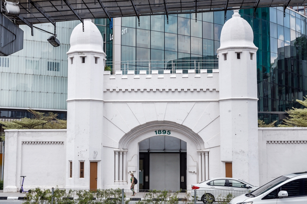 A general view of the Pudu Prison gate in front of LaLaport Bukit Bintang City Centre in Kuala Lumpur on July 30, 2024. — Picture by Firdaus Latif