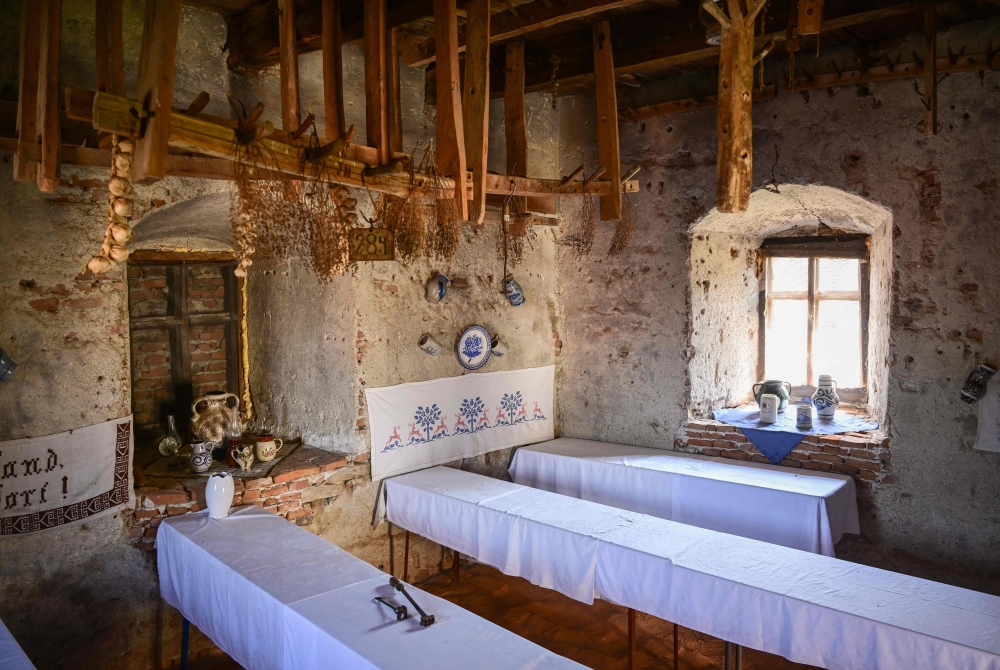 A view of a dining room set up for tourists in a tower of the fortified church in the village of Mosna, Romania on August 7, 2026. — AFP pic