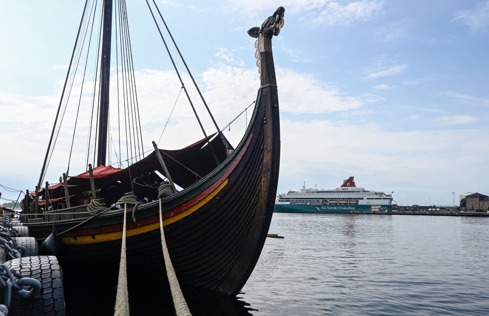 The Draken Harald Harfagre, the ship used in the movie “The Odyssey”, is docked outside the Oslo Opera House in the Norwegian capital on August 14, 2026. — AFP pic