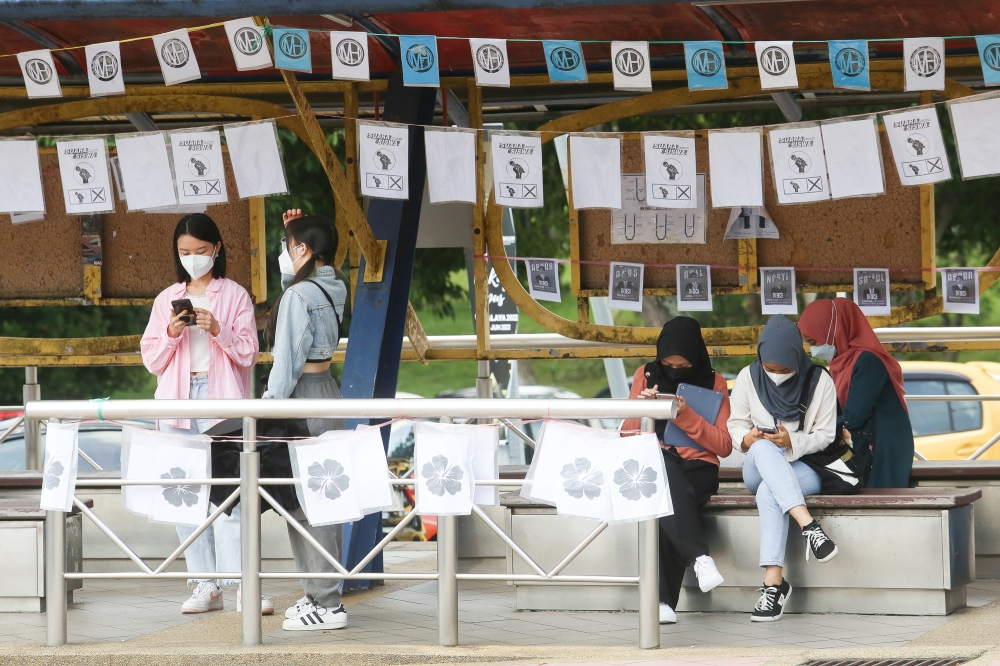 Posters are seen at Universiti Malaya ahead of campus elections in Kuala Lumpur on June 17, 2022. — Picture by Choo Choy May