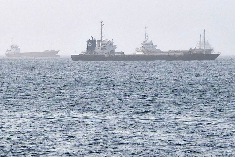 Vessels transiting through the Gulf of Oman are pictured off the coast of Muscat on July 25, 2026. — AFP pic