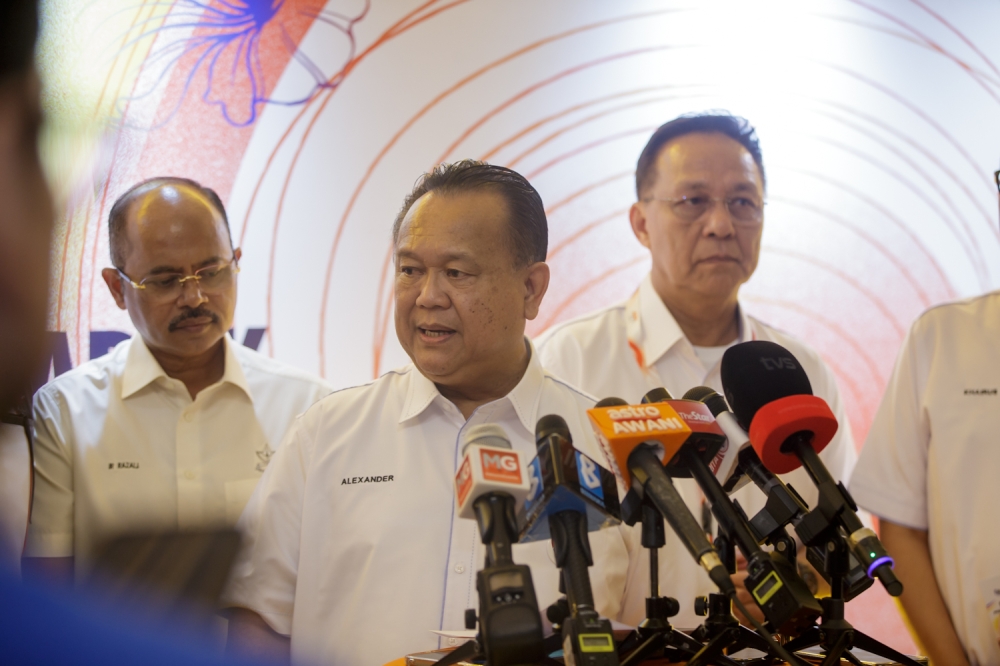 Works Minister Datuk Seri Alexander Nanta Linggi speaks to members of the media during a press conference following the ground-breaking ceremony for the third tunnel and widening project of the Kuala Lumpur-Karak (KLK) Highway at KM36.9 Eastbound, August 20, 2026. — Picture by Raymond Manuel